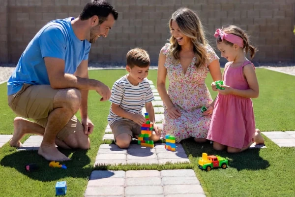 Family enjoying custom paver patio in Phoenix